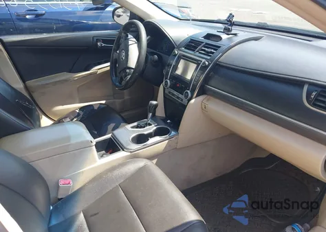 2014 Toyota Camry Hybrid Le z USA, uszkodzony, nr VIN 4T1BD1FK2EU102603